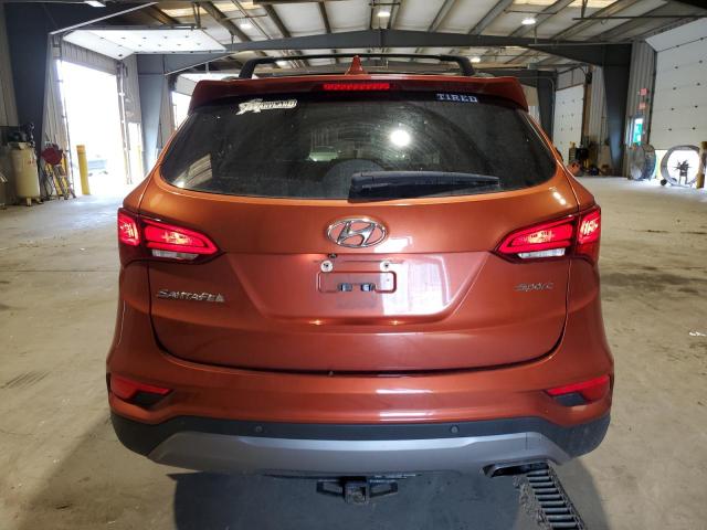 5XYZU3LB2HG414624 - 2017 HYUNDAI SANTA FE S ORANGE photo 6