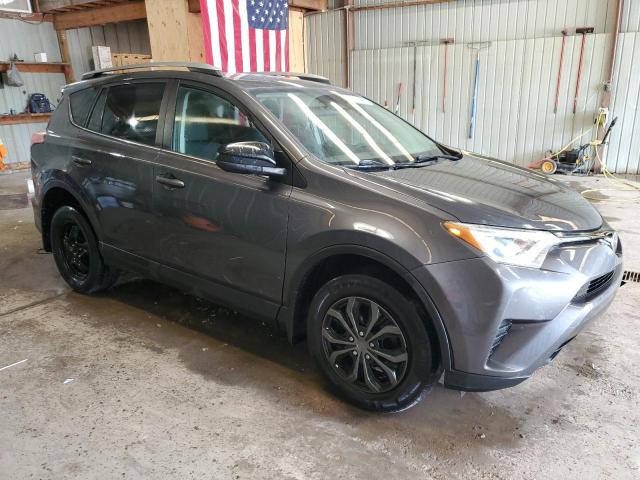 2T3BFREV7HW659586 - 2017 TOYOTA RAV4 LE ნაცრისფერი ფოტო 4