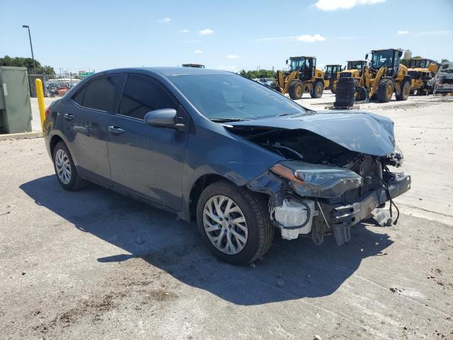 5YFBURHEXKP894289 - 2019 TOYOTA COROLLA L ნაცრისფერი ფოტო 4