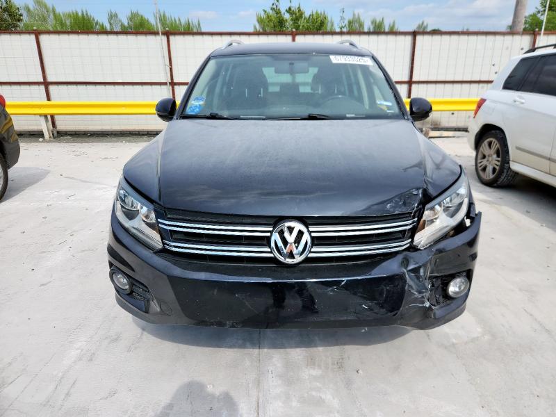 WVGAV3AX5EW548580 - 2014 VOLKSWAGEN TIGUAN S BLACK photo 5