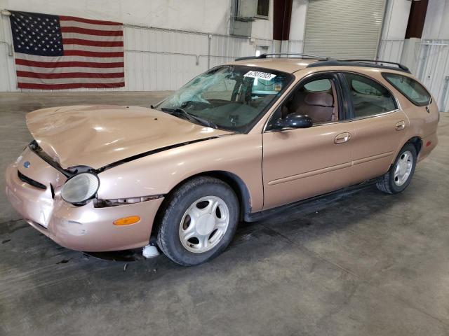 1FALP57U1VG114799 - 1997 FORD TAURUS GL GOLD photo 1