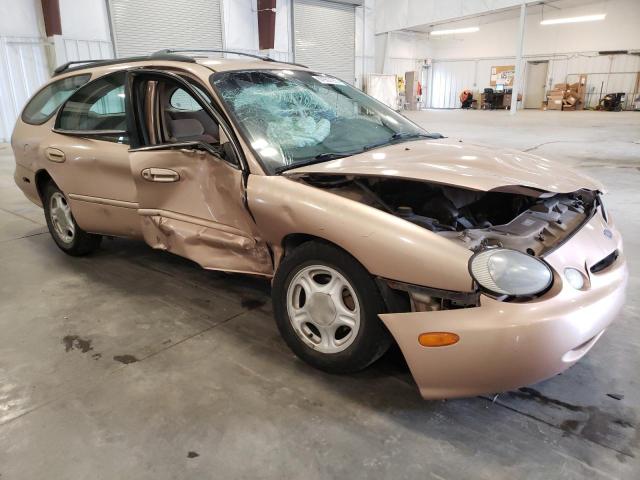 1FALP57U1VG114799 - 1997 FORD TAURUS GL GOLD photo 4