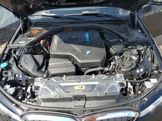 3MW5P9J07N8C76559 - 2022 BMW 330XE أسود صورة 11