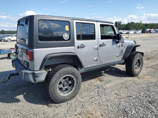 1C4BJWDG7HL590384 - 2017 JEEP WRANGLER U SPORT SILVER photo 3