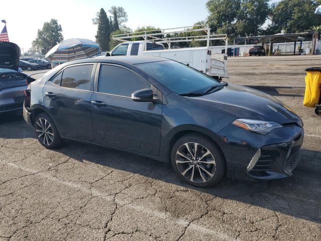 5YFBURHE0JP787430 - 2018 TOYOTA COROLLA L BLUE photo 4