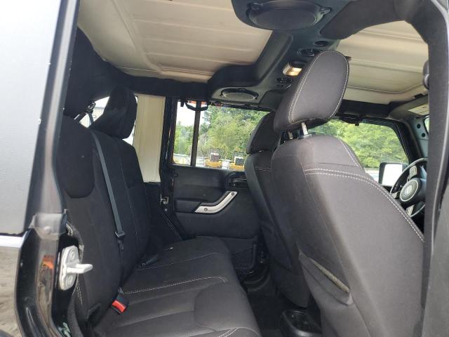 1C4BJWEG5EL141537 - 2014 JEEP WRANGLER U SAHARA BLACK photo 11