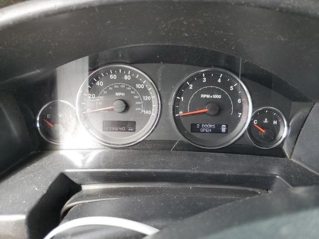 1J4RG4GK7AC132202 - 2010 JEEP COMMANDER SPORT Schwarz Foto 9