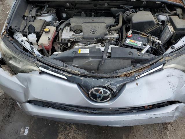 2T3ZFREV7HW360257 - 2017 TOYOTA RAV4 LE SILVER photo 11