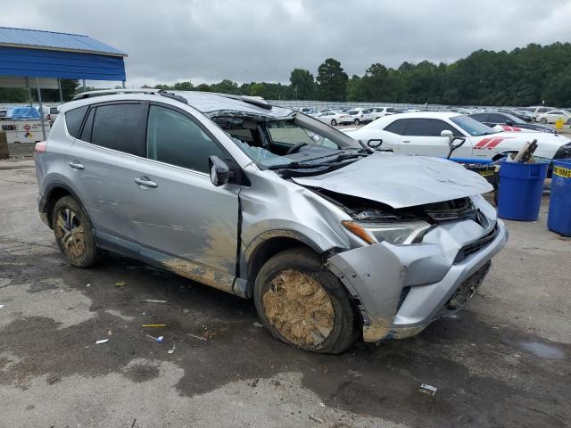 2T3ZFREV7HW360257 - 2017 TOYOTA RAV4 LE SILVER photo 4