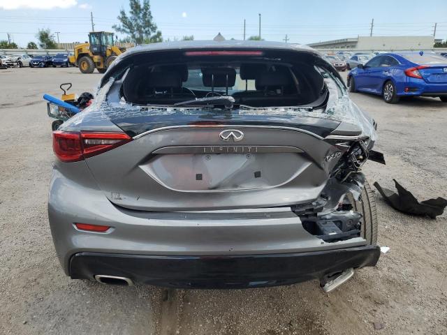 SJKCH5CP8JA056871 - 2018 INFINITI QX30 BASE SILVER photo 6