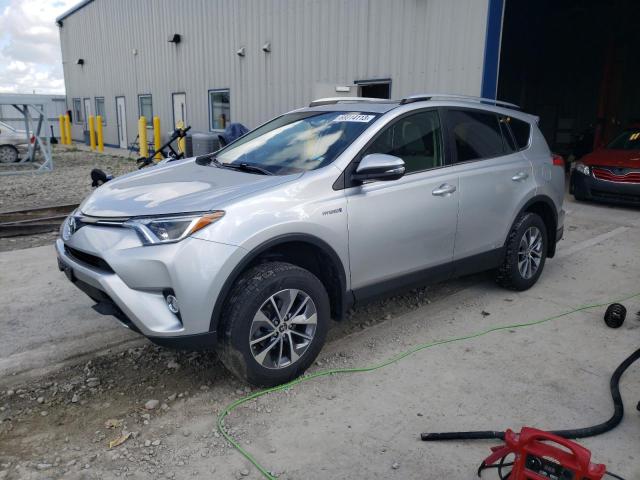 JTMRJREV6GD015229 - 2016 TOYOTA RAV4 HV XLE SILVER photo 1