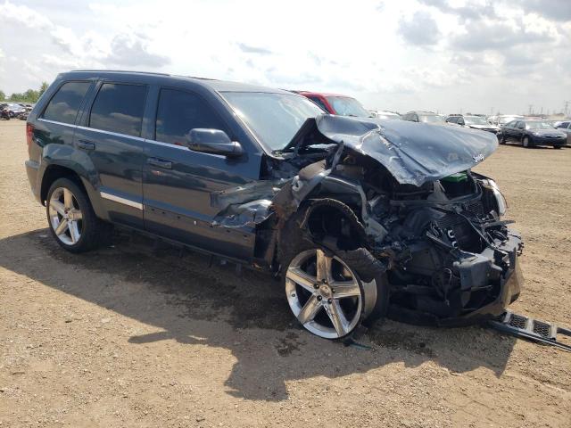 1J8HR78328C100958 - 2008 JEEP GRAND CHER SRT-8 BLUE photo 4