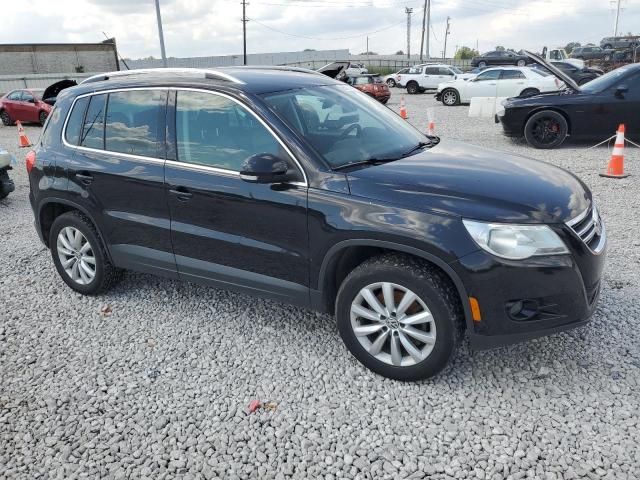 WVGBV7AX9BW530963 - 2011 VOLKSWAGEN TIGUAN S 黑色 照片 4