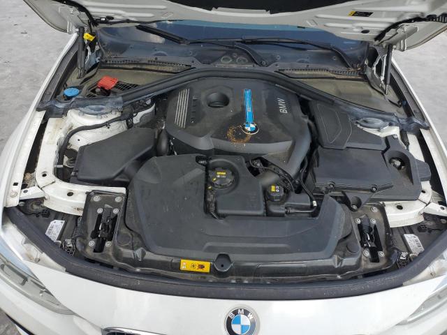 WBA8E1C53JA177815 - 2018 BMW 330E WHITE photo 11