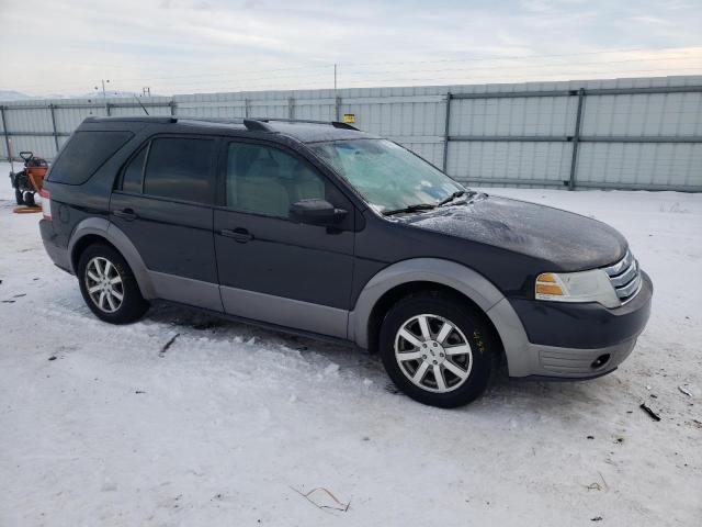 1FMDK05W98GA07908 - 2008 FORD TAURUS X SEL BLACK photo 4