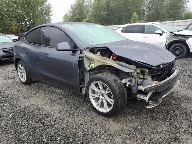 7SAYGDEE8PF762582 - 2023 TESLA MODEL Y Grau Foto 4