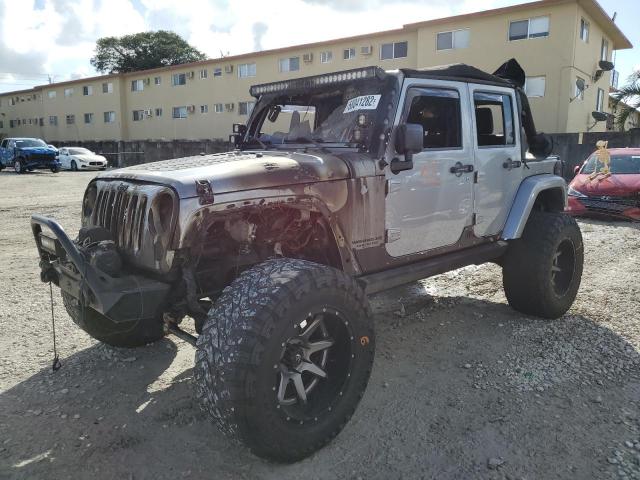 1C4HJWEG5GL153927 - 2016 JEEP WRANGLER U SAHARA SILVER photo 1