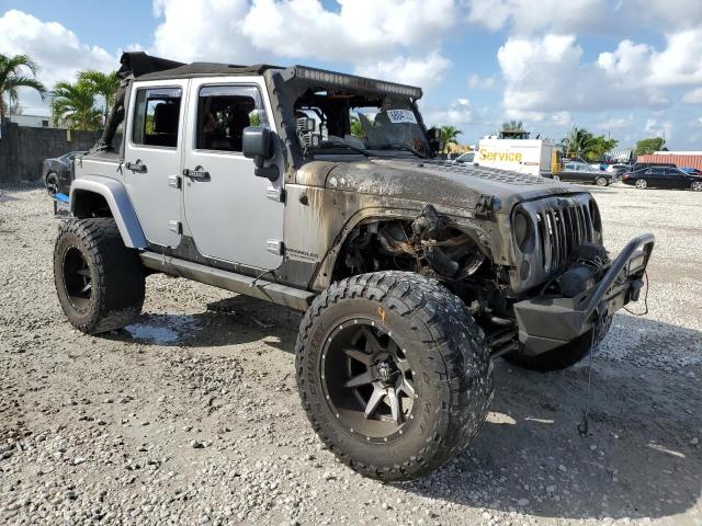 1C4HJWEG5GL153927 - 2016 JEEP WRANGLER U SAHARA SILVER photo 4