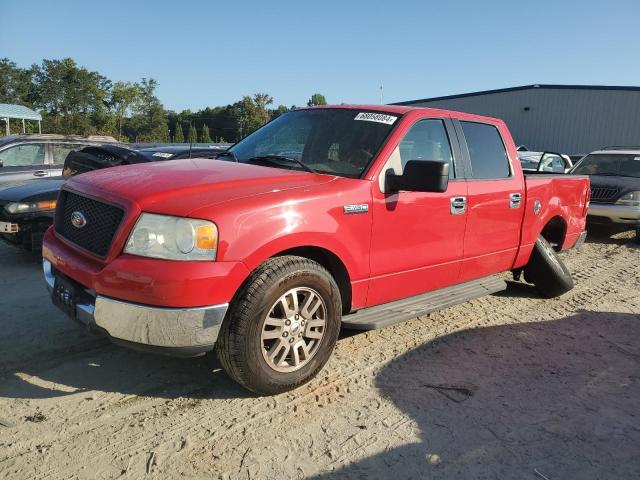 1FTPW12595KC60503 - 2005 FORD F150 SUPERCREW RED photo 1