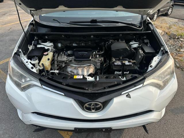 JTMBFREV8HJ152761 - 2017 TOYOTA RAV4 LE თეთრი ფოტო 9