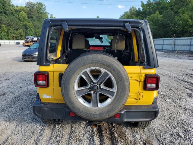 1C4HJXEN4KW624350 - 2019 JEEP WRANGLER U SAHARA Gelb Foto 6