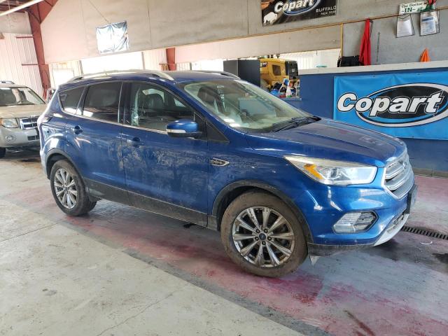 1FMCU9J99HUD86596 - 2017 FORD ESCAPE TITANIUM BLUE photo 4