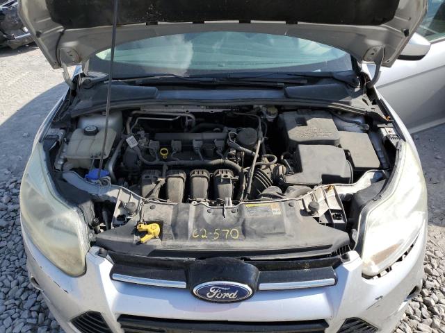 1FAHP3F28CL308633 - 2012 FORD FOCUS SE SILVER photo 11