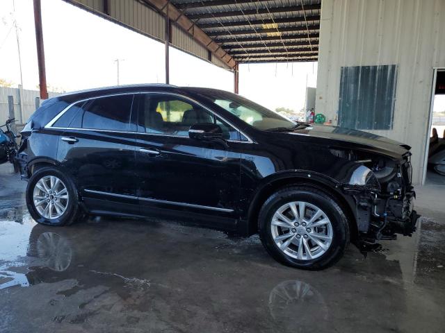 1GYKNAR49PZ149562 - 2023 CADILLAC XT5 LUXURY BLACK photo 4