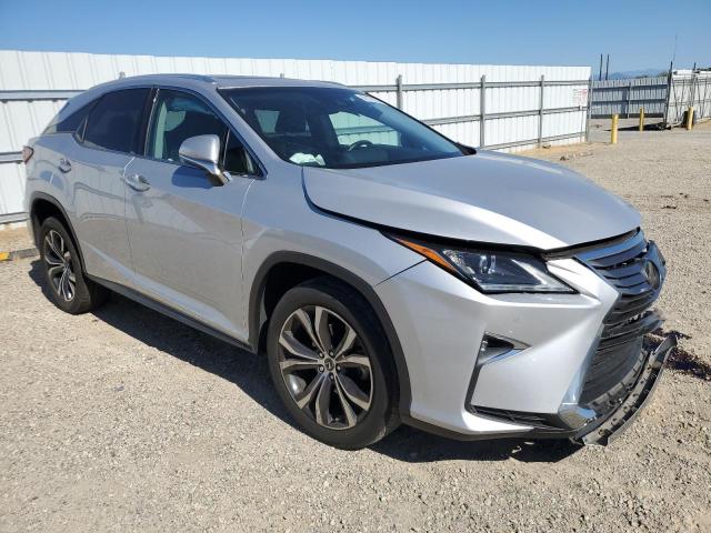 2T2ZZMCA2KC128592 - 2019 LEXUS RX 350 BASE SILVER photo 4