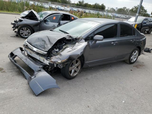 19XFA16639E005593 - 2009 HONDA CIVIC LX-S Gris photo 1