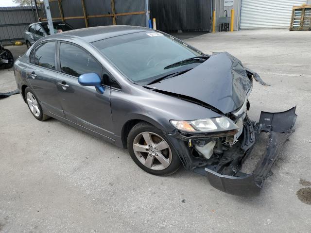 19XFA16639E005593 - 2009 HONDA CIVIC LX-S Gris photo 4