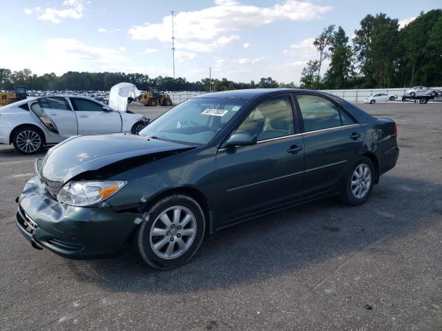 JTDBF30K120035756 - 2002 TOYOTA CAMRY LE GREEN photo 1