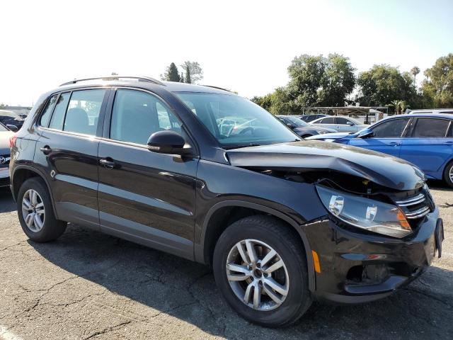 WVGBV7AX2FW588726 - 2015 VOLKSWAGEN TIGUAN S BLACK photo 4