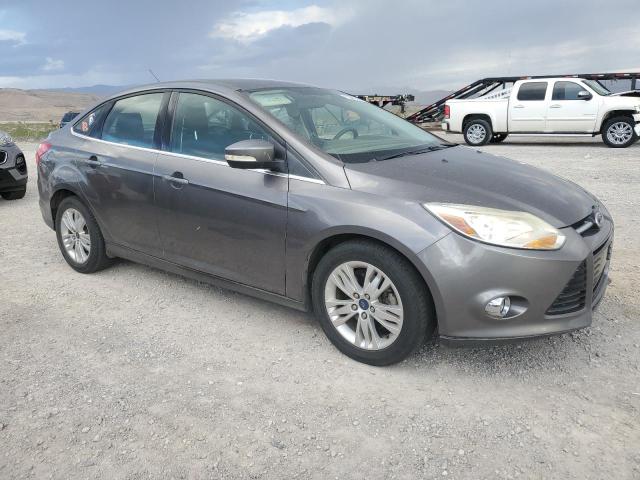 1FAHP3H29CL405627 - 2012 FORD FOCUS SEL GRAY photo 4