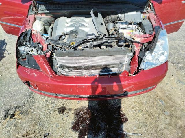 KNDMC233176015382 - 2007 HYUNDAI ENTOURAGE GLS RED photo 12