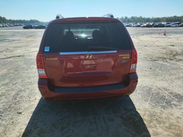 KNDMC233176015382 - 2007 HYUNDAI ENTOURAGE GLS RED photo 6