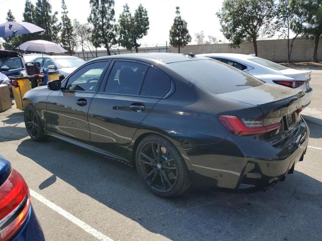 3MW69FF0XP8D48959 - 2023 BMW 330I BLACK photo 2