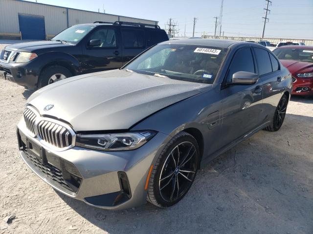 3MW39FS00P8D05935 - 2023 BMW 330XE Մոխրագույն լուսանկար 1
