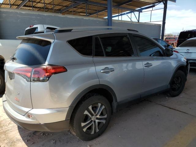 2T3ZFREV7GW312546 - 2016 TOYOTA RAV4 LE SILVER photo 3