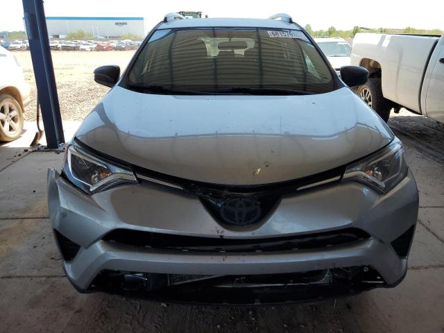 2T3ZFREV7GW312546 - 2016 TOYOTA RAV4 LE SILVER photo 5