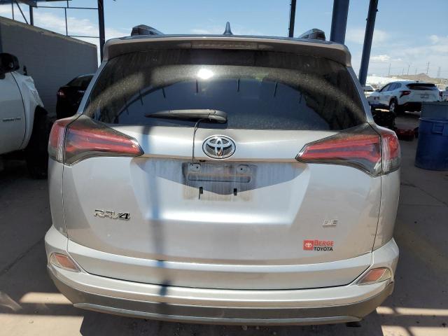 2T3ZFREV7GW312546 - 2016 TOYOTA RAV4 LE SILVER photo 6