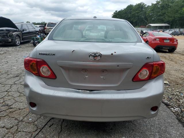 1NXBU40E79Z032431 - 2009 TOYOTA COROLLA BASE Сріблястий фото 6