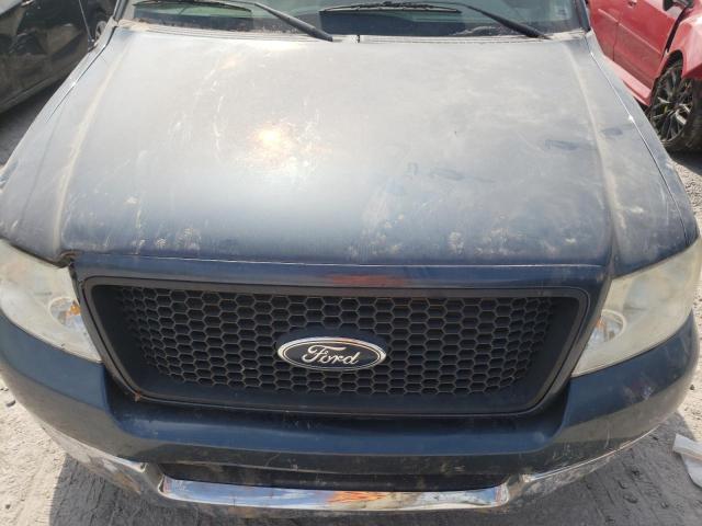 1FTPX12594NC73374 - 2004 FORD F150 BLUE photo 11