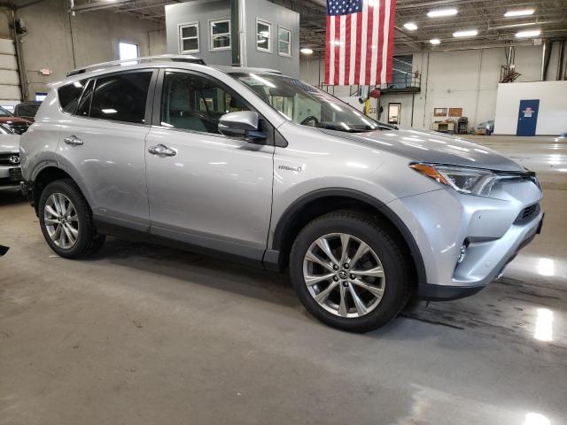 JTMDJREV4JD171979 - 2018 TOYOTA RAV4 HV LIMITED SILVER photo 4