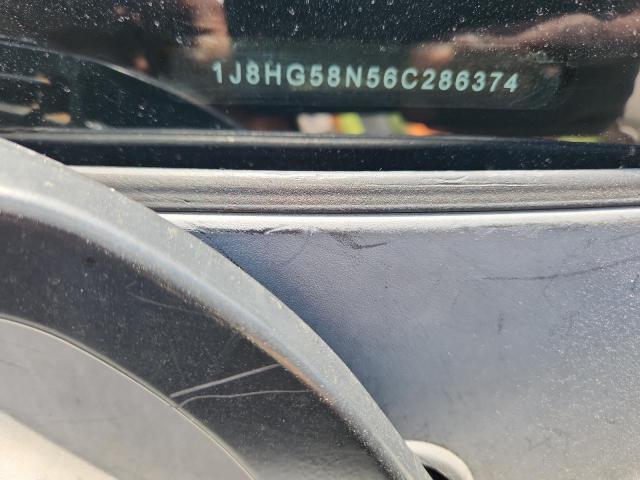 1J8HG58N56C286374 - 2006 JEEP COMMANDER LIMITED Schwarz Foto 14