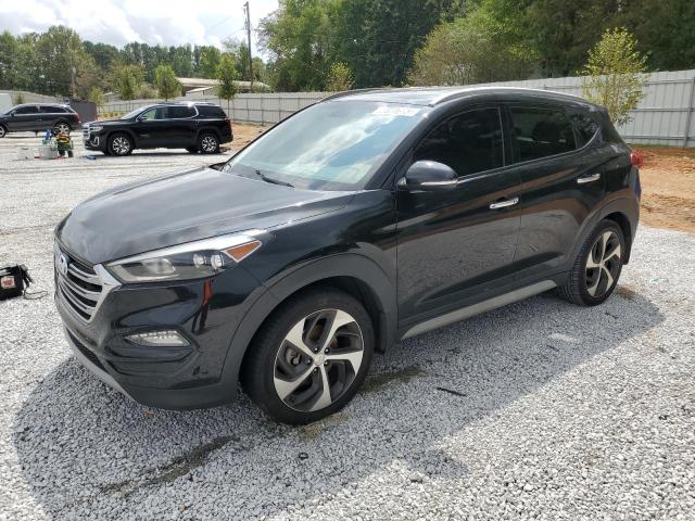 KM8J33A28JU718480 - 2018 HYUNDAI TUCSON VALUE BLACK photo 1