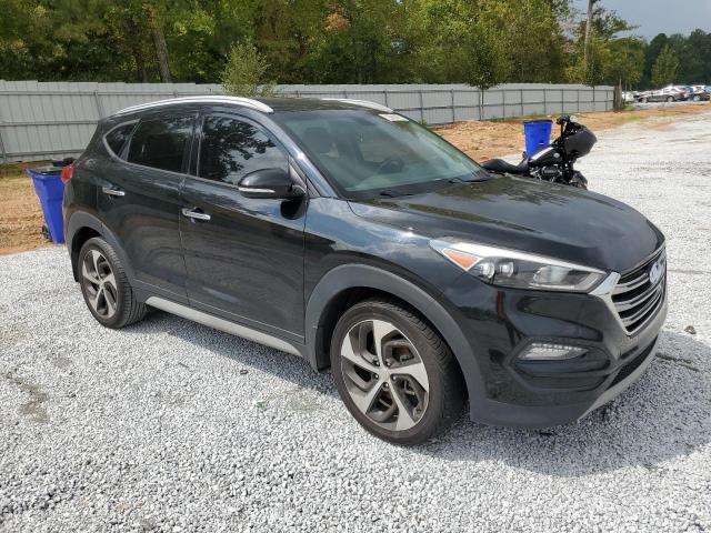 KM8J33A28JU718480 - 2018 HYUNDAI TUCSON VALUE BLACK photo 4