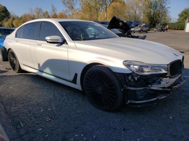 WBA7F2C5XHG421742 - 2017 BMW 750 XI WHITE photo 4