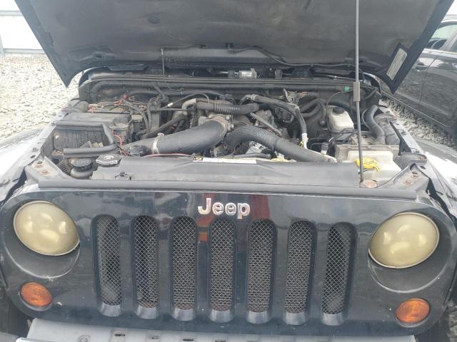 1J4AA5D19BL638812 - 2011 JEEP WRANGLER SAHARA Qara foto 12