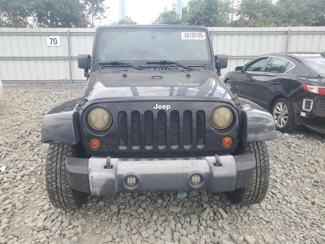 1J4AA5D19BL638812 - 2011 JEEP WRANGLER SAHARA Qara foto 5